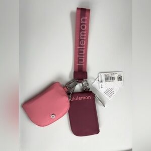 lululemon pink and burgundy wristlet keychain pouch set